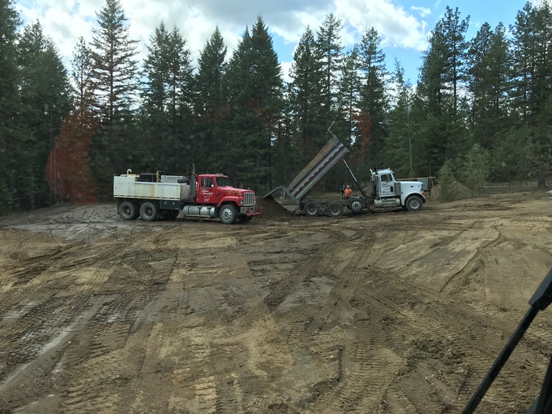 Water truck supporting road construction